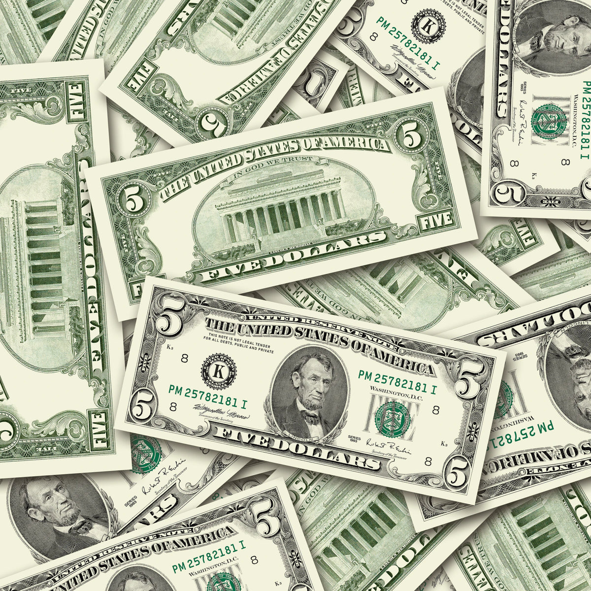$5 1990s Close-Up prop bills with printed fronts and backs scattered randomly; one complete front and back centered.