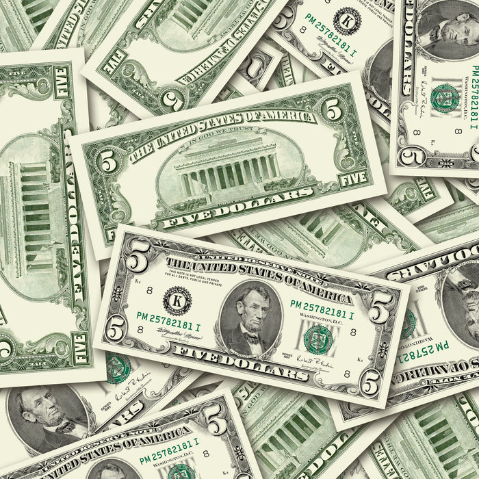 $5 1990s Close-Up prop bills with printed fronts and backs scattered randomly; one complete front and back centered.
