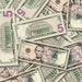 $5 New Series Close-Up prop bills with printed fronts and backs scattered randomly; one complete front and back centered.