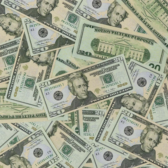 Actual Full Print $20 prop bills scattered together with an Andrew Jackson front-facing bill and motion picture markings